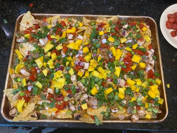 Fondue & Caribbean Chicken nachos from our kitchen
